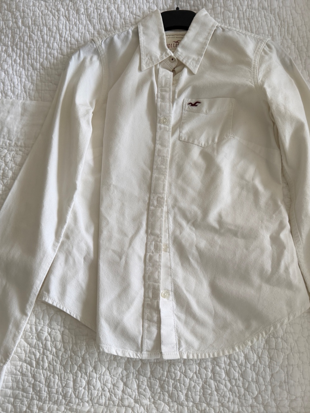 Women's white button-down shirt